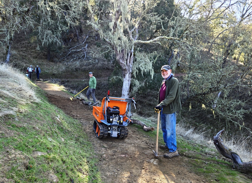 Reshaping the out-slope of the trail.